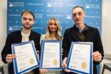 group of students holding certificates