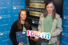 A man and woman with an I did it sign