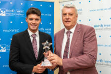 two men with an award