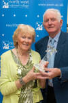two people with an award