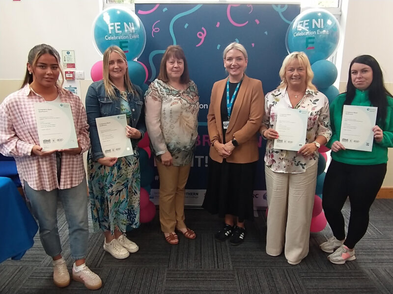 group of people with certificates