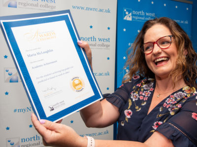 Woman holding certificate