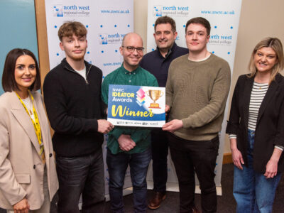 Winners and judges pictured with the winning logo