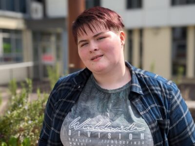 student pictured outside a college building
