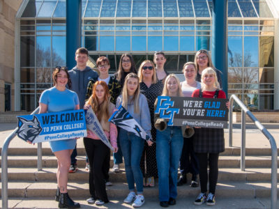 Students pictured outside a building